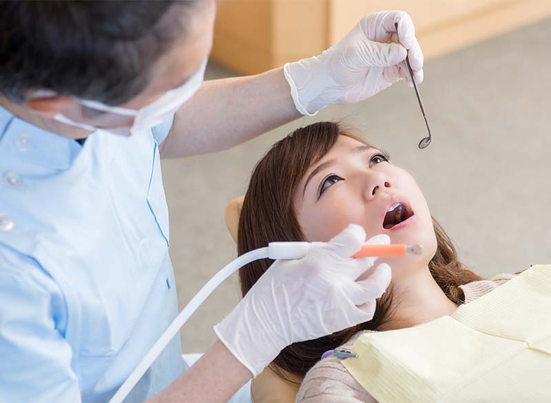 患者さまの負担を抑えたむし歯治療